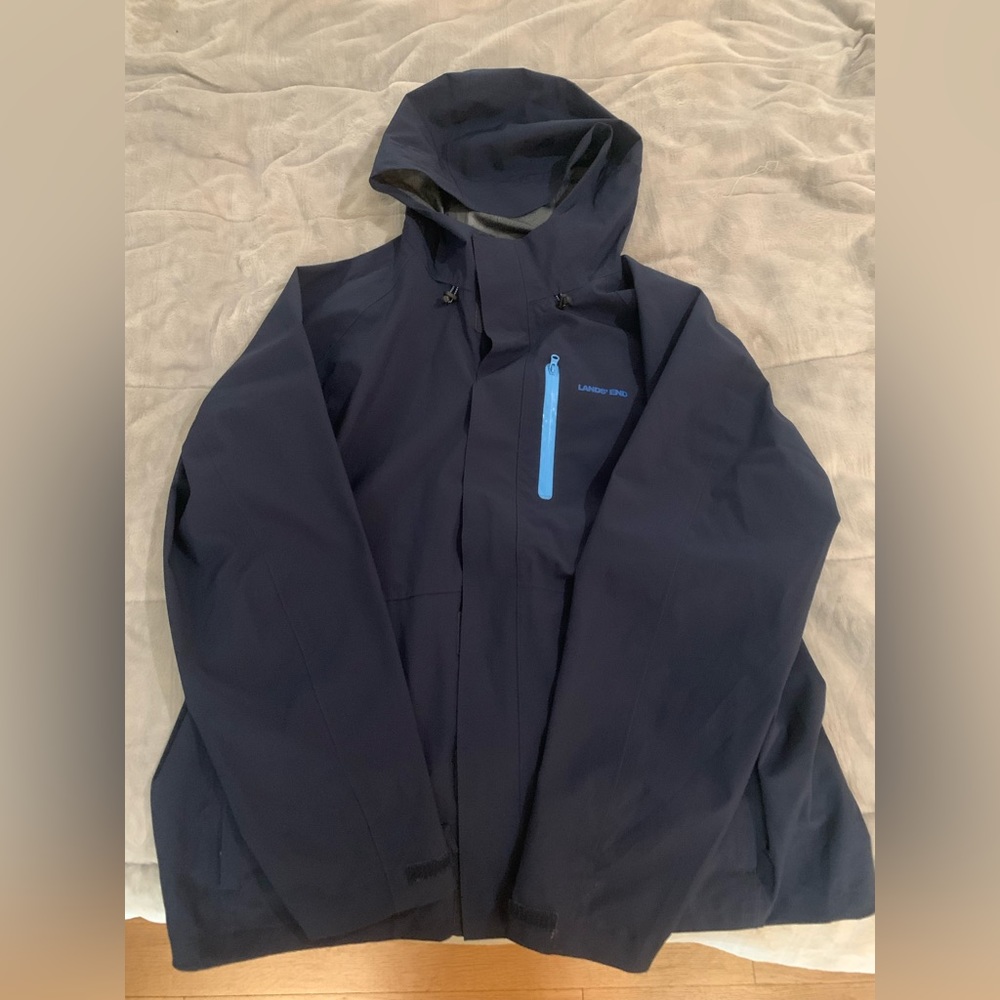 Lands End hooded navy blue rain jacket.
